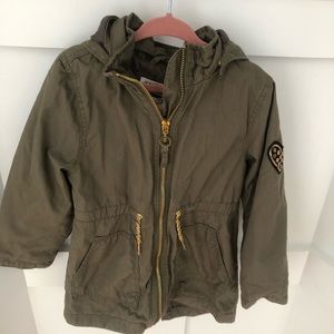 Little girls green jacket with gold details